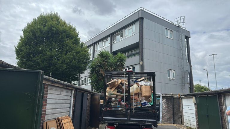 Magnus clearance vehicle loaded with cardboard and household waste