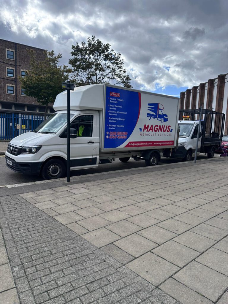 Branded Magnus Removals box van parked on a city street