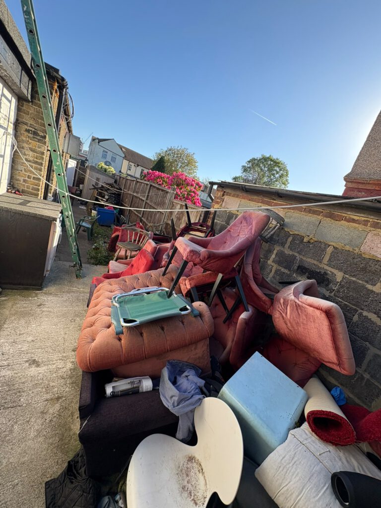 Unwanted sofas and furniture awaiting clearance