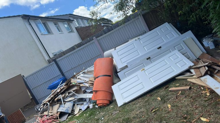Old doors and timber waste awaiting collection