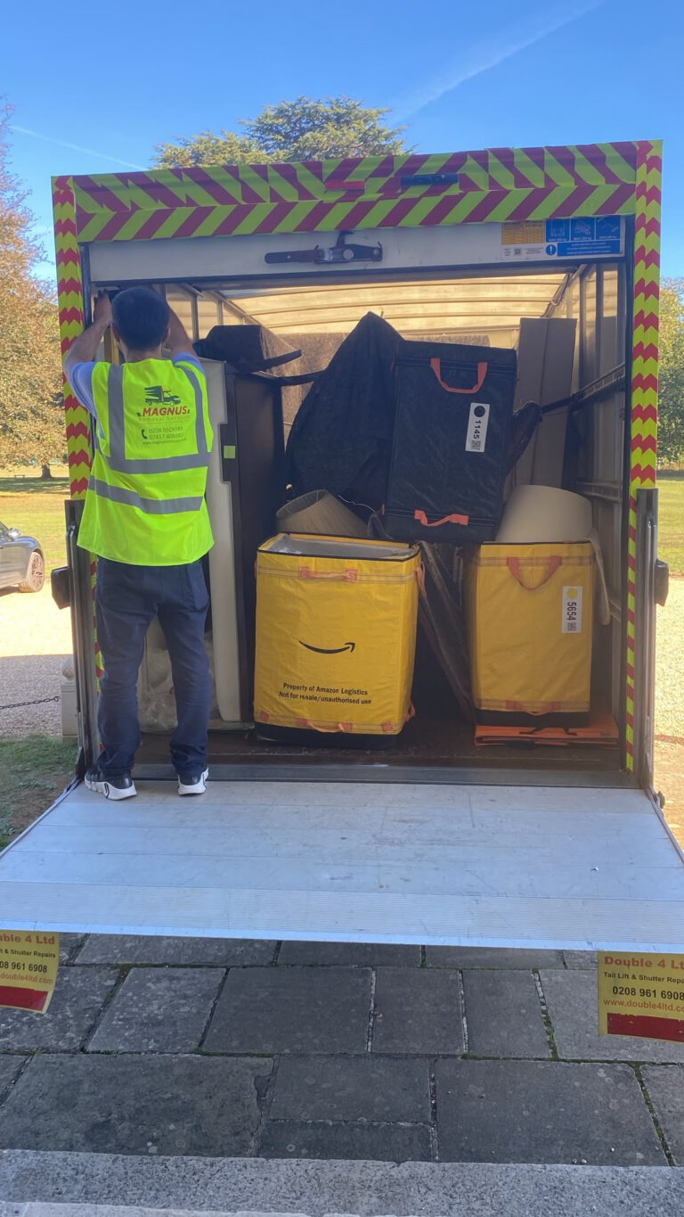 Magnus Removals team member securing a load in the van